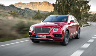Bentley Bentayga luxury SUV front tracking