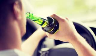 Person drinking while driving