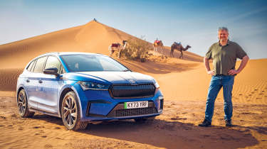 Auto Express consumer editor Chris Rosamond standing next to a Skoda Enyaq