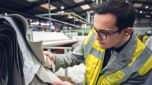 Auto Express consumer reporter Tom Jervis inspecting a sample of leather