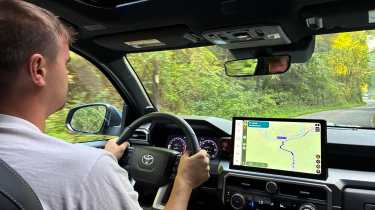 Auto Express senior news reporter Alastair Crooks driving the Toyota 4Runner