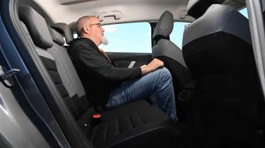 Citroen e-C4 - rear seats, with Senior test editor, Dean Gibson