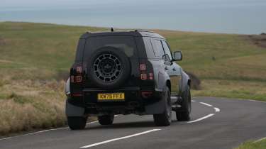 Land Rover Defender OCTA Black - rear cornering (dry)