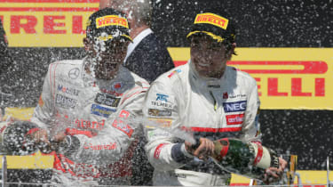 Lewis Hamilton and Sergio Perez celebrate