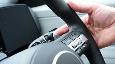 Auto Express creative director Darren Wilson operaing the Hyundai Kona&#039;s stalk controls