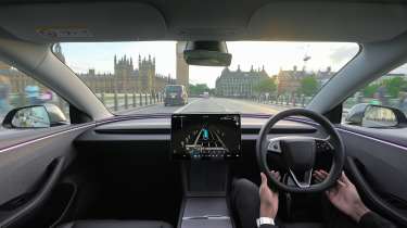 Self-driving Tesla Model 3 on Westminster Bridge