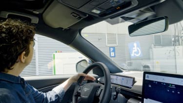 Robotic charging station - driving into accessible charging bay