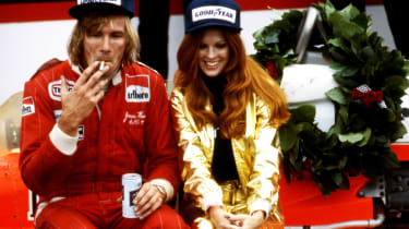 James Hunt celebrates winning the 1977 US Grand Prix win with a cigarette, a beer, and a Penthouse Pet