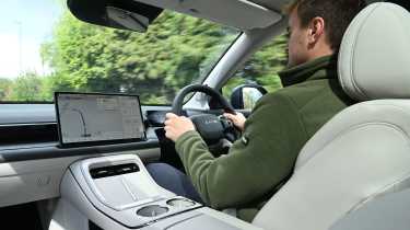 Alastair Crooks driving the Aion V