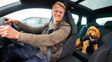 Cocker Spaniel and Doctor Scott Miller inside car