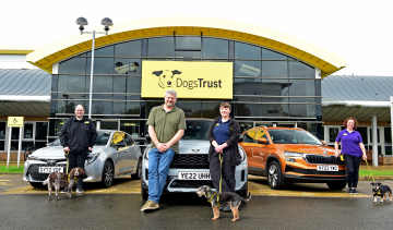 Auto Express current affairs and features editor Chris Rosamond with members of the Dogs Trust