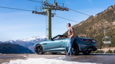 Jaguar F-Type P450 75 - Matt Robinson leaning on car looking at cable car