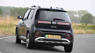 Hyundai Inster - rear cornering, right