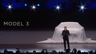 Tesla Model 3 covered car