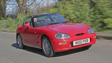 Used Suzuki Cappuccino - front tracking 