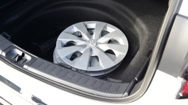 Toyota Corolla Commercial - wheel trims in boot