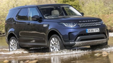 Land Rover Discovery wading through water