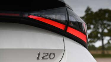 Hyundai i20 being driven in the UK - rear tail light 