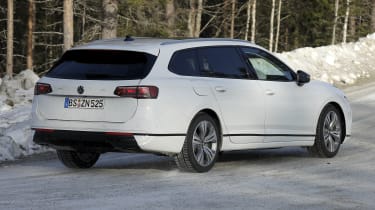 Volkswagen Passat estate (white with camouflage) - rear cornering