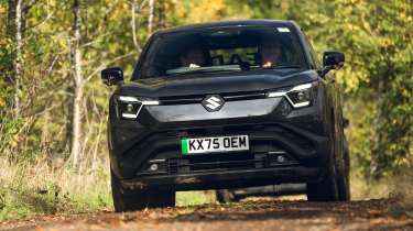 Suzuki e Vitara - front end on a country track