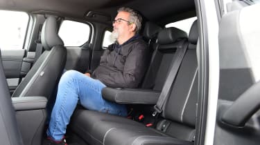 Auto Express senior test editor Dean Gibson sitting in the back of the Mazda MX-30