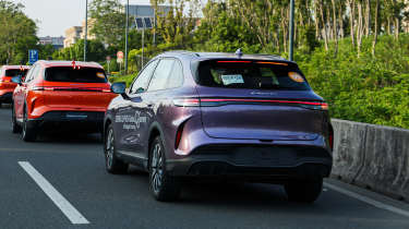 Collection of Lepas SUVs driving on motorway - front