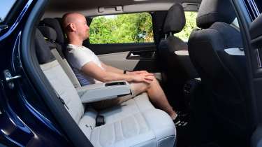 Auto Express chief reviewer Alex Ingram sitting in the Citroen C5 X&#039;s back seat