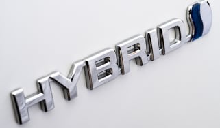 toyota hybrid badge