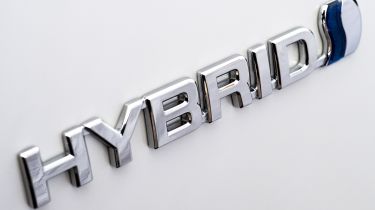 toyota hybrid badge