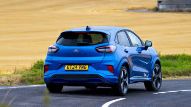 Facelifted Ford Puma being driven in the UK - rear cornering 