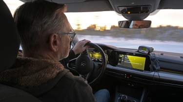 John Barker driving a VW Golf