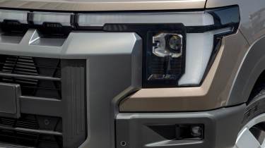 KGM Musso Rhino - front light