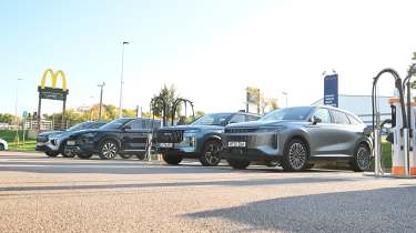 Chinese hybrid SUV mega test - cars being charged, front static