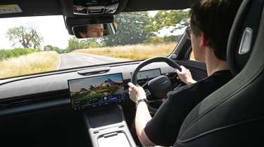 Auto Express consumer editor Tom Jervis driving the Omoda 7 SHS-P Noble Tech