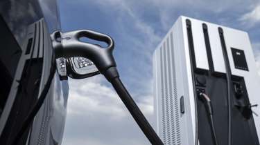 Electric car hooked up to chargepoint