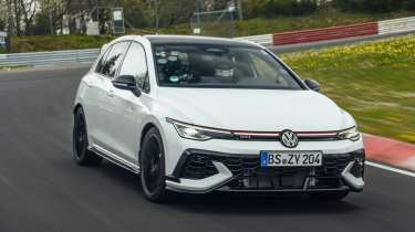 Volkswagen Golf GTI Edition 50 - front tracking white