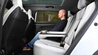 Renault Scenic E-Tech - rear seats being sat in by Auto Express chief reviewer Alex Ingram