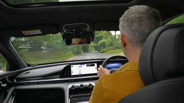 Richard Ingram driving the Omoda 9