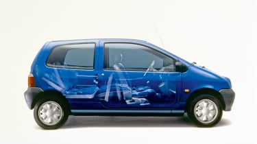 A side view of a blue Renault Twingo.