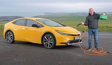 Toyota Prius Excel - header with charging cable