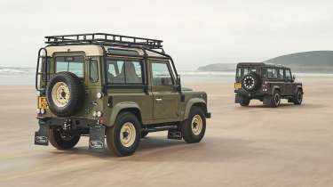 Land Rover Defender V8 90 by Works Bespoke - two cars rear tracking