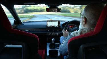 Auto Express senior road test editor Dean Gibson driving a Honda Civic Type R