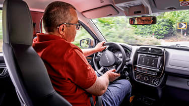 Dacia Spring LHD Editor-at-Large, John Mcllroy, driving