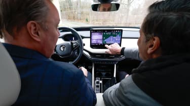 Skoda CEO Klaus Zellmer demonstrating the Skoda Enyaq&#039;s infotainment system to Auto Express editor-in-chief Steve Fowler