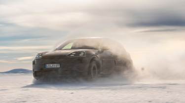 Porsche Cayenne Electric - front snow