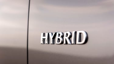 Infiniti Q70 hybrid badge