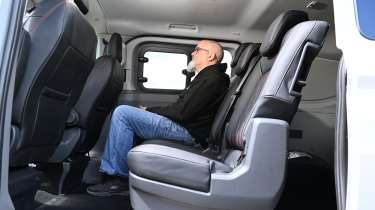 Auto Express senior test editor Dean Gibson sitting in the Volkswagen Transporter Sportline's rear seat