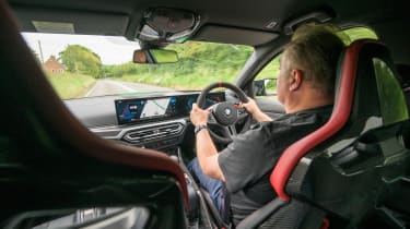 Auto Express editor-in-chief Steve Fowler driving the BMW M3 CS