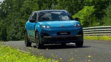 Nissan Micra EV (blue) - front tracking