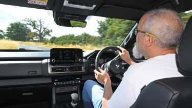 Auto Express senior road test editor Dean Gibson driving the Mitsubishi L200